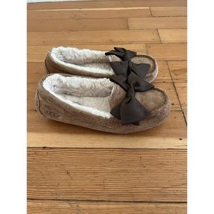 Women’s Ugg Slippers with Brown Bow.